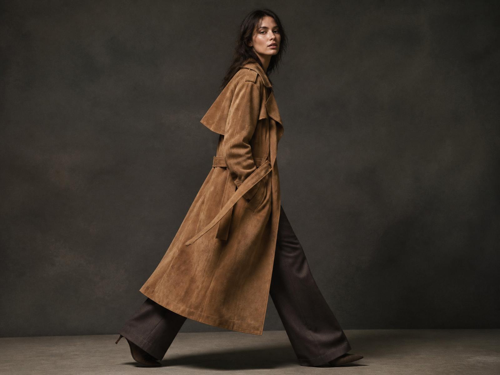 Model in a tan suede leather trench coat
